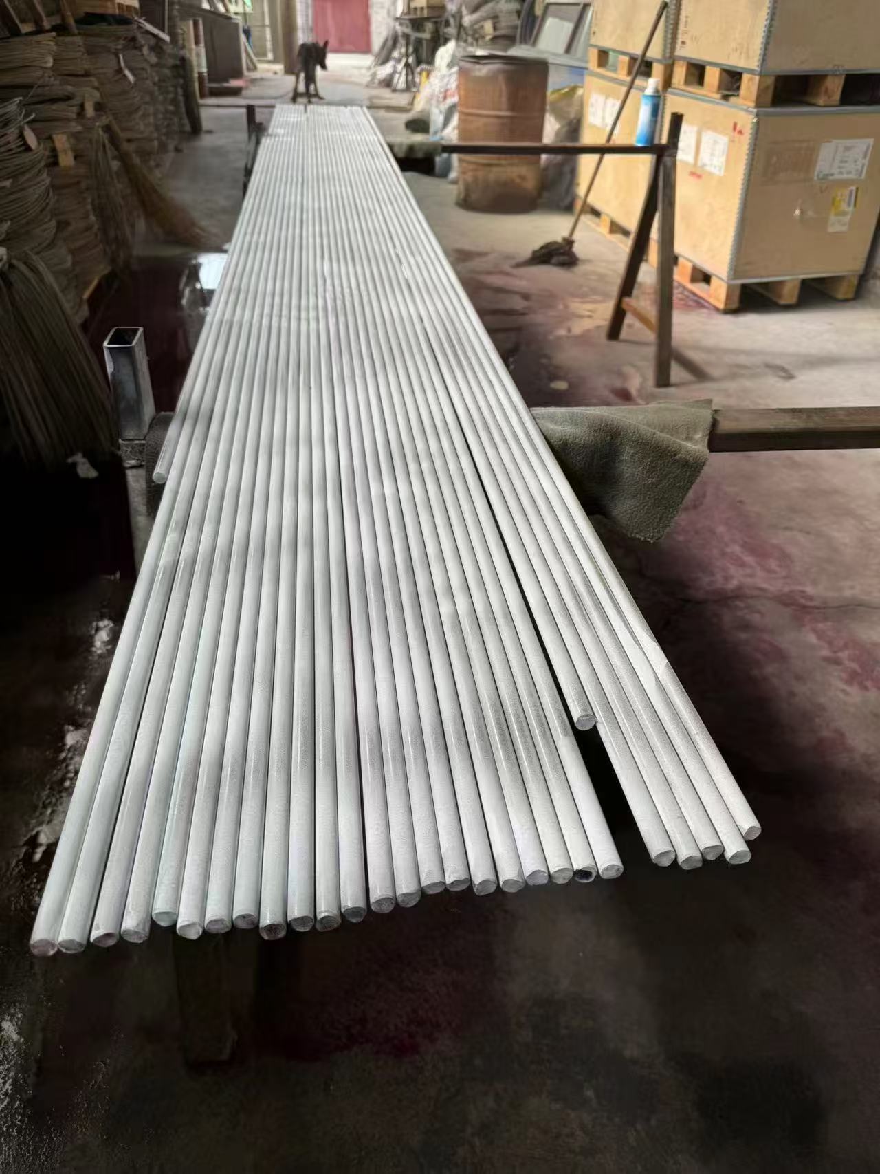 Inconel 725 round bars under liquid dye-penetrant (PT) inspection to ISO 10423 PSL 3