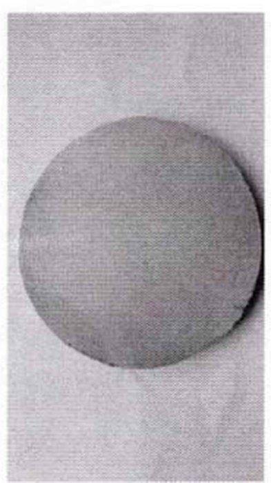 Etched macro cross-section of Inconel 725 round bar, heat 2321-044, showing sound, segregation-free structure